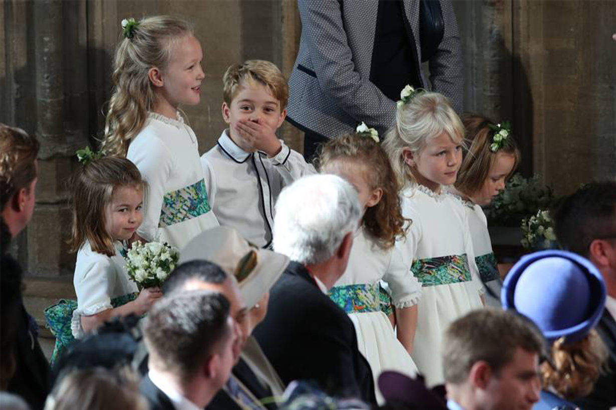 Prince George and Savannah Phillips larking around at Princess Eugenie's wedding
