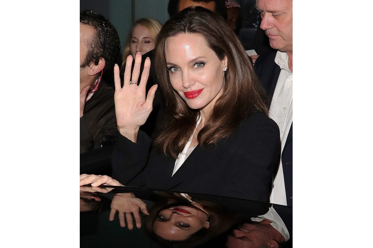 angelina jolie styleing trench coat dress tips