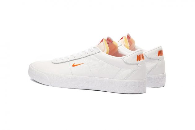 nike sb swoosh logo sneakers white leather orange
