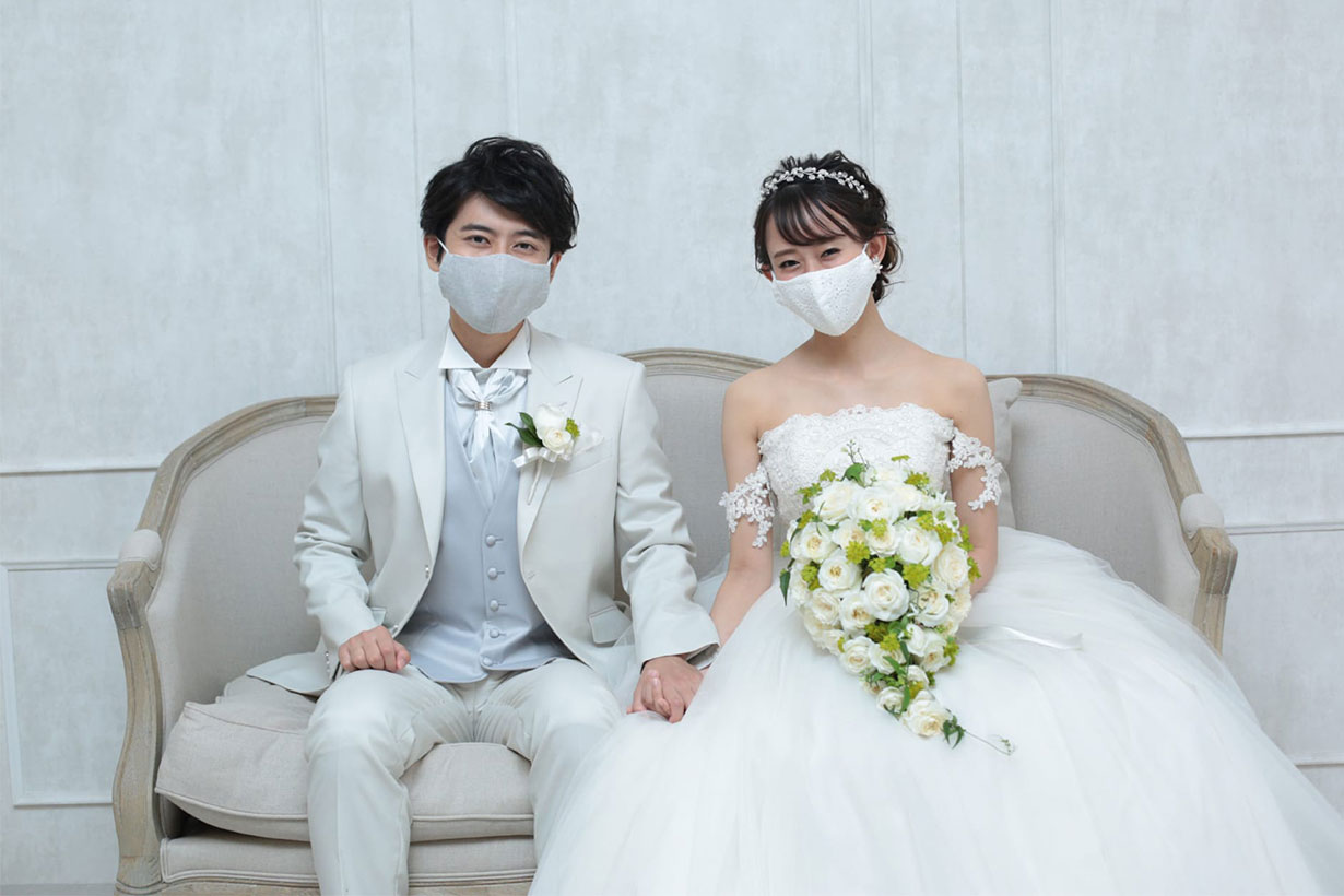 Japanese Bride and Groom Wearing Masks